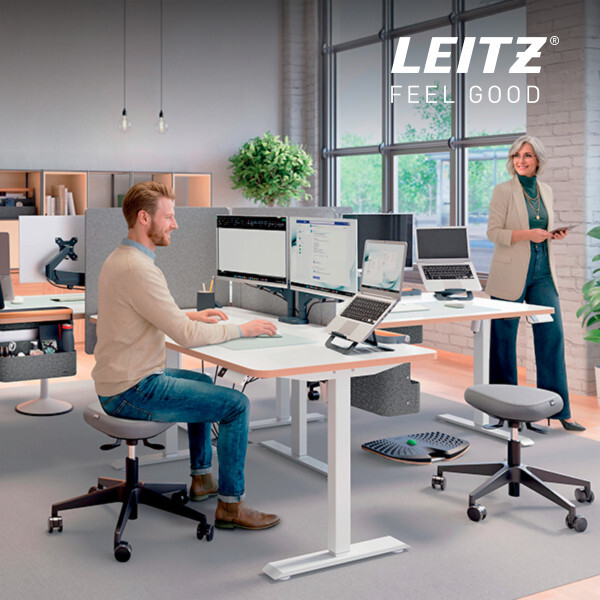 Valoisassa toimistossa Leitz Ergo -tuotteita henkilöiden käytössä
